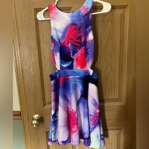 Pretty watercolor dress with cutout at the waist